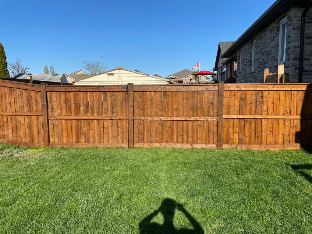Deck staining project in London, Ontario - natural cedar finish